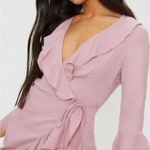 This elegant pink wrap dress Prettylittlething Dresses | Color: Pink | Size: 6